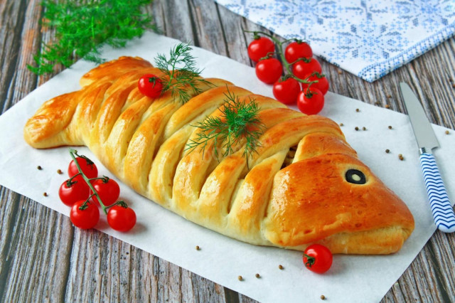 Fish pie in the oven made of yeast dough