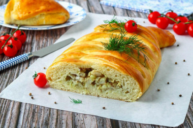 Fish pie in the oven made of yeast dough