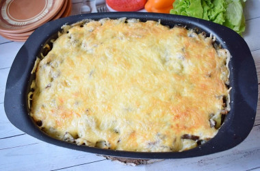 Potato casserole with mushrooms in the oven