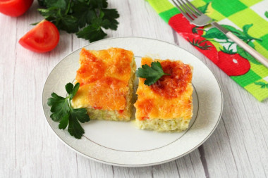 Casserole of zucchini and tomatoes with cheese in the oven