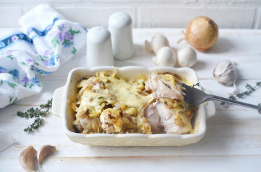 Chicken with mushrooms and cheese in the oven