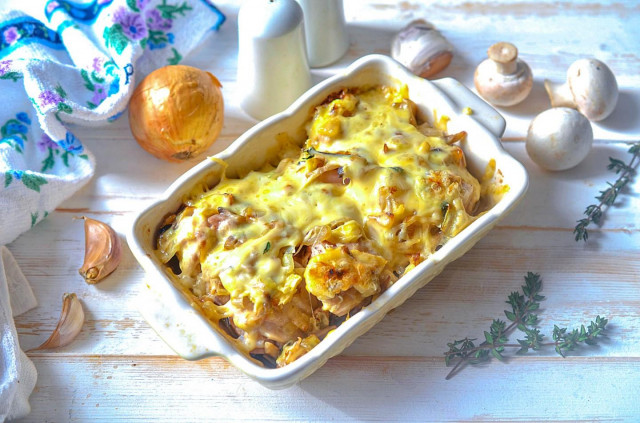Chicken with mushrooms and cheese in the oven