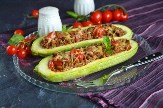 Stuffed zucchini with minced meat and cheese baked in the oven