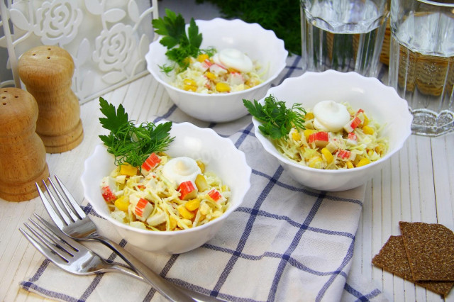 Crab sticks salad with cabbage, corn and egg