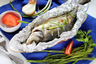 Whole fish baked in the oven in foil