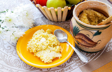 Millet porridge with milk in the oven in a pot