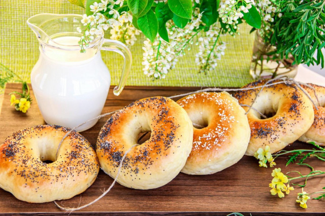 homemade bagels in the oven with poppy seeds