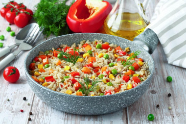 Rice with vegetables in a pan