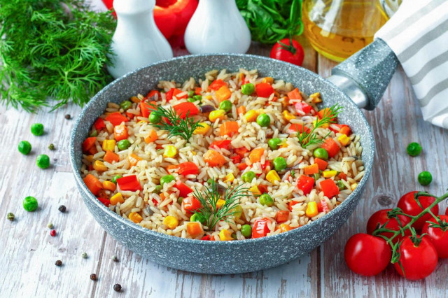 Rice with vegetables in a pan