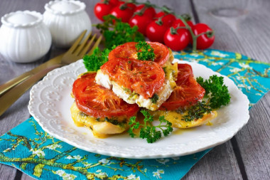 Chicken chop with tomato and cheese in the oven