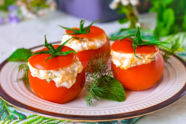 Stuffed tomatoes with cheese in the oven baked