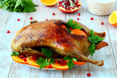 Baked duck with oranges in the oven