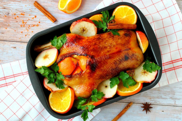 Baked duck with oranges in the oven