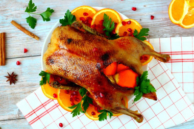 Baked duck with oranges in the oven