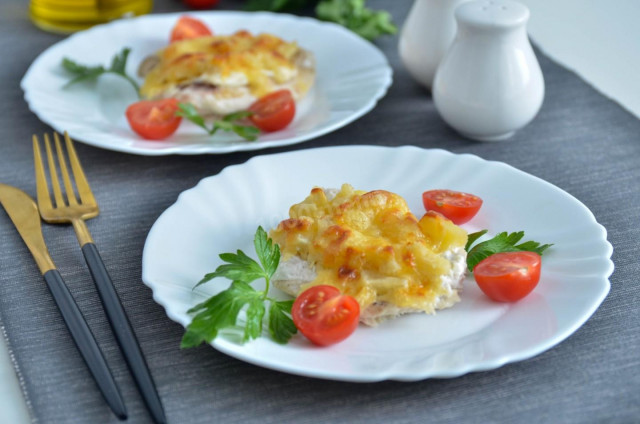Chicken fillet with pineapples in the oven