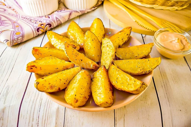 Potatoes in the peel baked in the oven in a rustic way