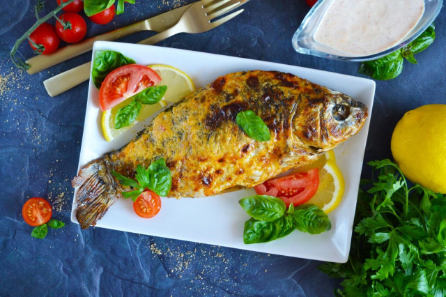 Crucian carp baked in foil in the oven