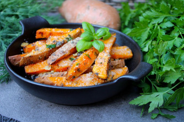 Sweet potato baked in the oven with cheese