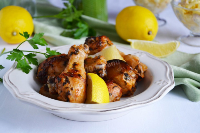 Baked chicken drumsticks in the oven with lemon and paprika