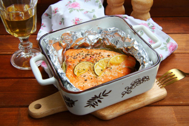 Baked salmon in the oven in foil