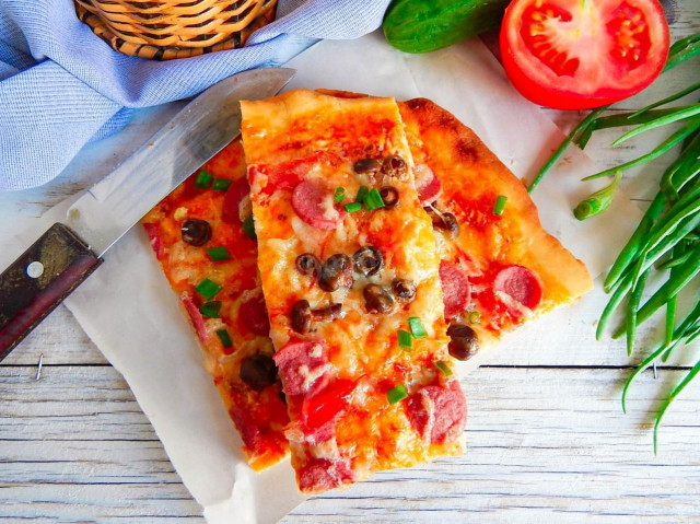 Quick pizza with kefir in the oven