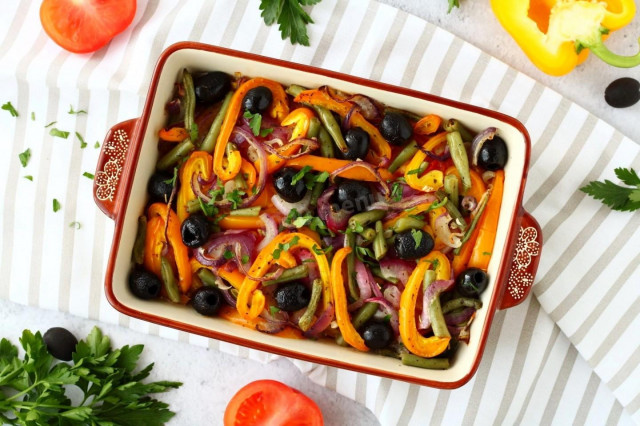 Pink salmon baked in the oven with juicy vegetables