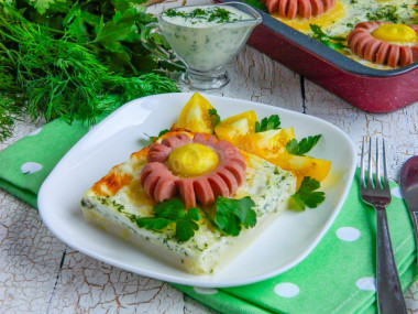 Sun casserole from mashed potatoes with sausages in the oven