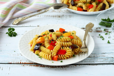 Pasta with vegetables in a frying pan