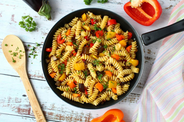Pasta with vegetables in a frying pan