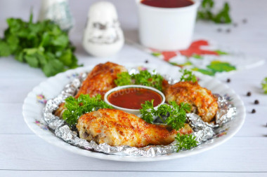 Baked chicken drumsticks in foil in the oven