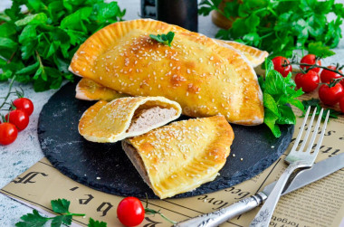 Chebureks with minced meat in the oven