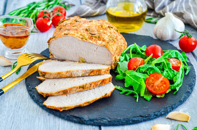 Pork with garlic in foil in the oven