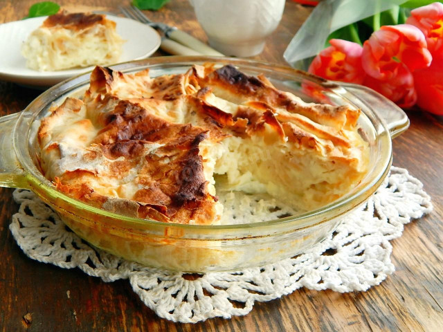 Pita bread pie with cottage cheese in the oven