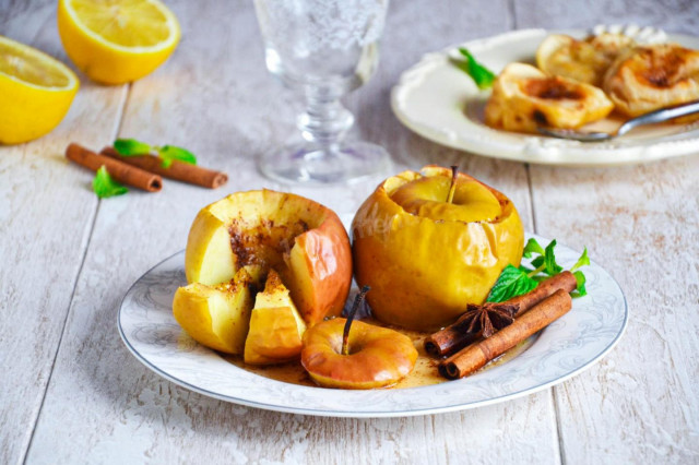 Baked apples with cinnamon in the oven