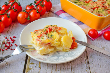 Casserole potato tomato cheese in the oven