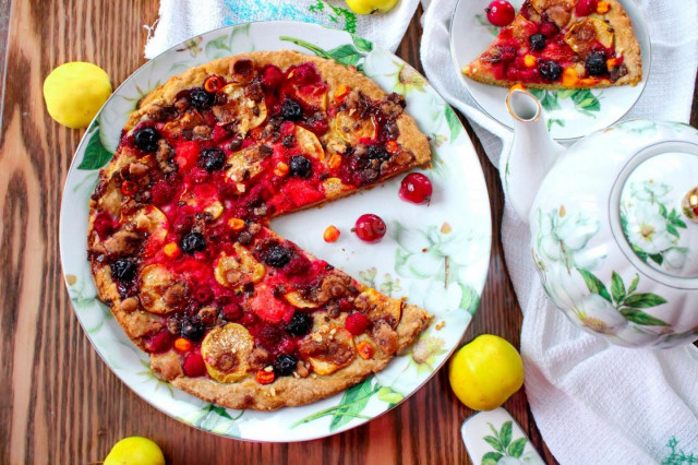 Sweet pizza with fruits in the oven