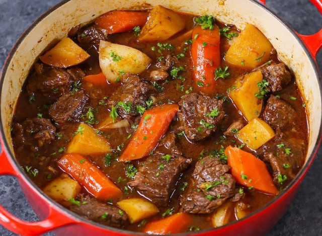 Stewed meat with vegetables in the oven