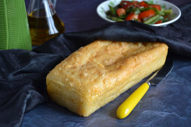 Homemade bread with cheese in the oven