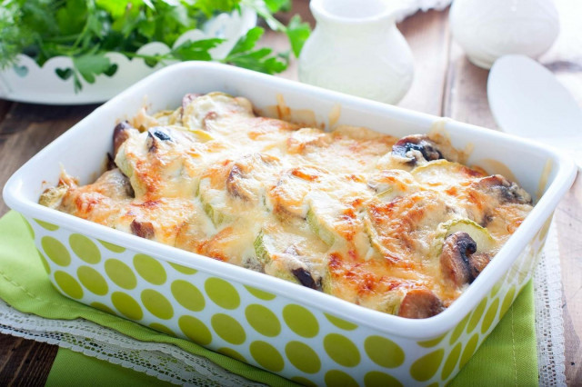 Zucchini with mushrooms baked in the oven