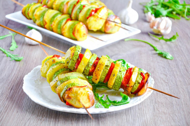 Vegetables on skewers in the oven