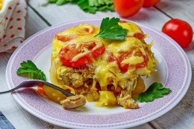 Chicken fillet with potatoes and tomatoes in the oven