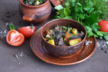 Vats in pots in the oven in Georgian