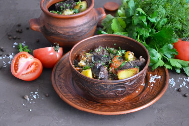 Vats in pots in the oven in Georgian