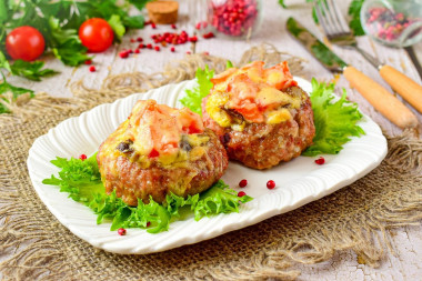 Minced meat nests stuffed with cheese and mushrooms in the oven