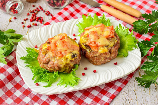 Minced meat nests stuffed with cheese and mushrooms in the oven