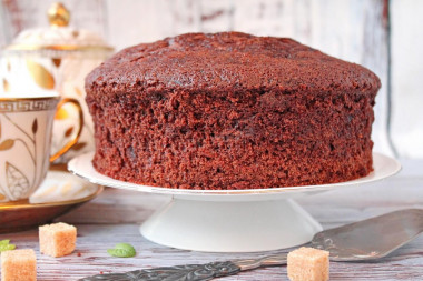 Chocolate sponge cake on boiling water in the oven