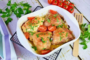 Chicken thighs in mayonnaise with garlic in the oven