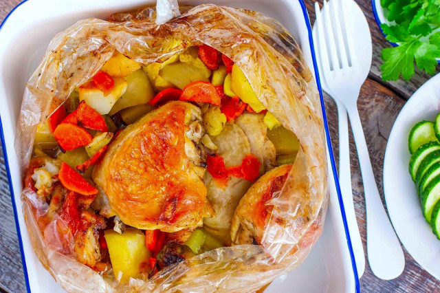 Chicken with vegetables in the sleeve in the oven