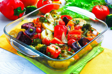 Vegetables baked in the oven on a baking sheet