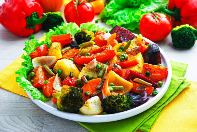 Vegetables baked in the oven on a baking sheet